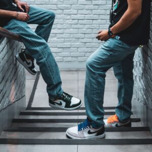 Stylish sneakers showcased on a modern stairway, capturing urban fashion in Kuwait.